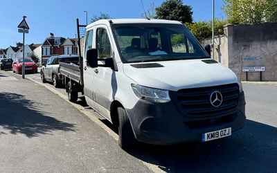KM19 OZJ, a White Mercedes Sprinter parked in Hollingdean