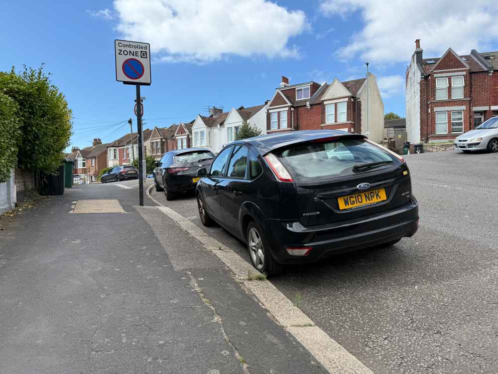 Photograph of WG10 NPK - a Black Ford Focus parked in Hollingdean by a non-resident. The ninth of nine photographs supplied by the residents of Hollingdean.