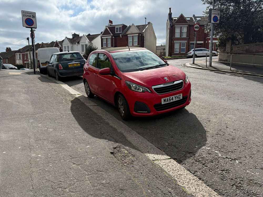 Photograph of MA64 YHZ - a Red Peugeot 108 parked in Hollingdean by a non-resident who uses the local area as part of their Brighton commute. The twelfth of fourteen photographs supplied by the residents of Hollingdean.