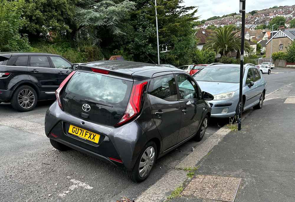 Photograph of GU71 FXX - a Grey Toyota Aygo parked in Hollingdean by a non-resident who uses the local area as part of their Brighton commute. The second of nine photographs supplied by the residents of Hollingdean.