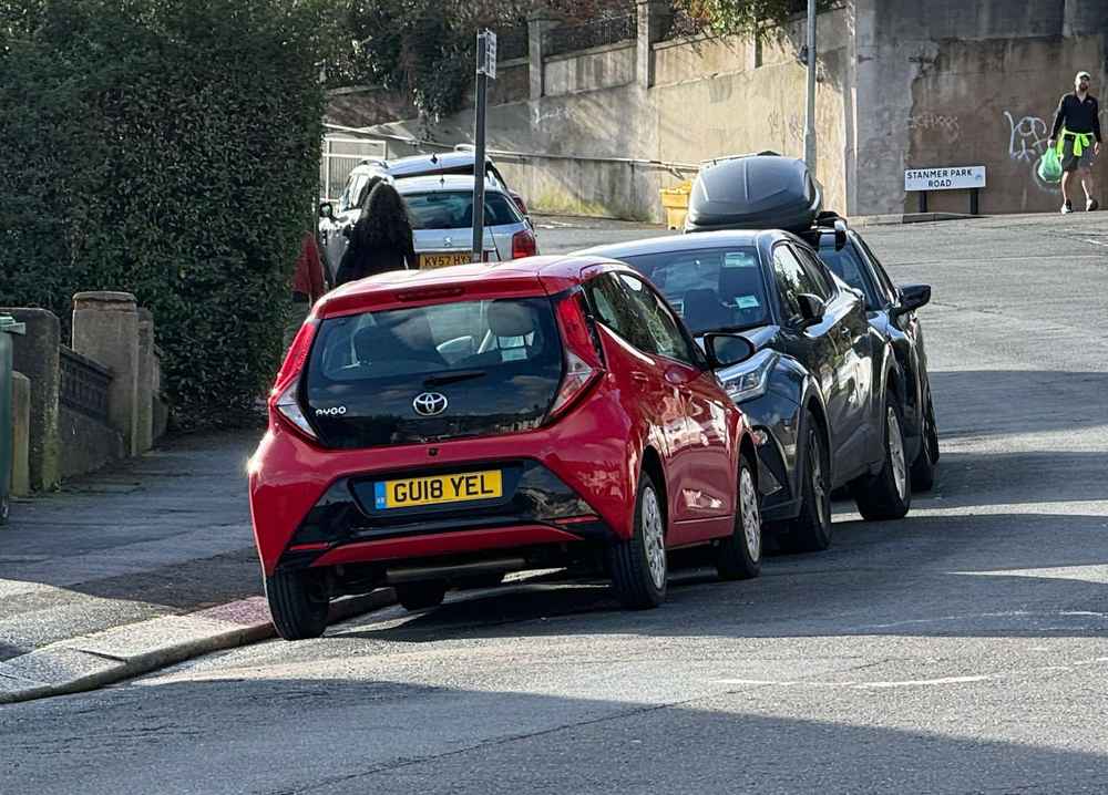 Photograph of GU18 YEL - a Red Toyota Aygo parked in Hollingdean by a non-resident. The third of ten photographs supplied by the residents of Hollingdean.