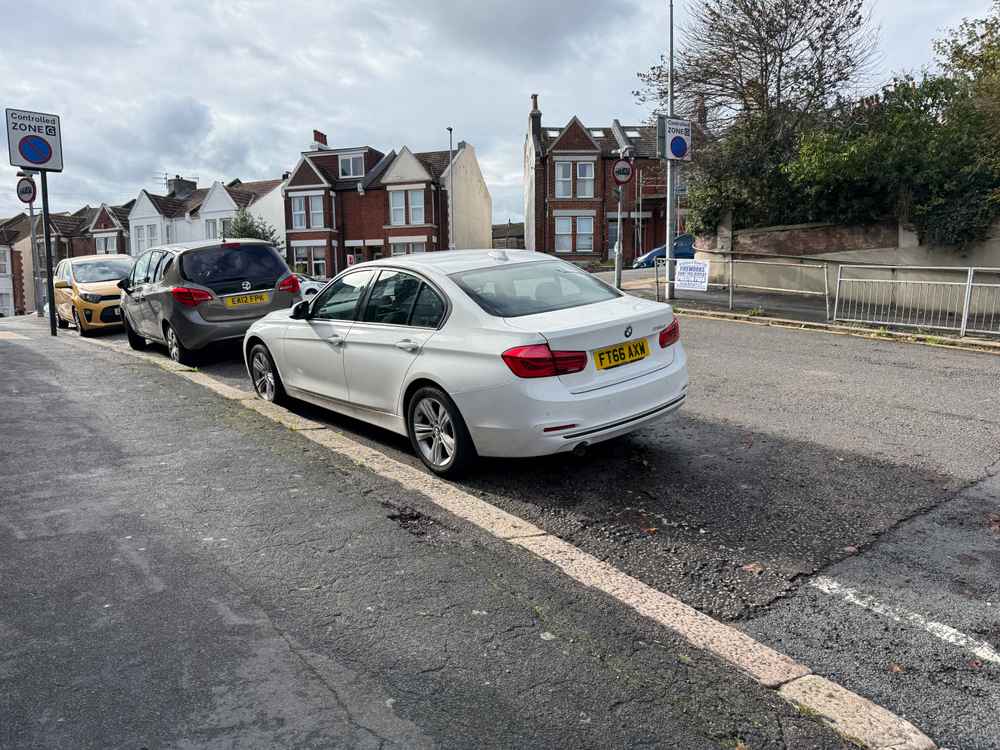 Photograph of FT66 AXW - a White BMW 3 Series parked in Hollingdean by a non-resident who uses the local area as part of their Brighton commute. The twenty-first of twenty-one photographs supplied by the residents of Hollingdean.