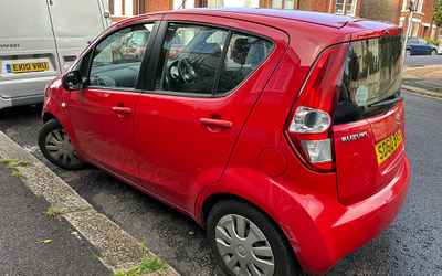 SD60 BVS, a Red Suzuki Splash parked in Hollingdean