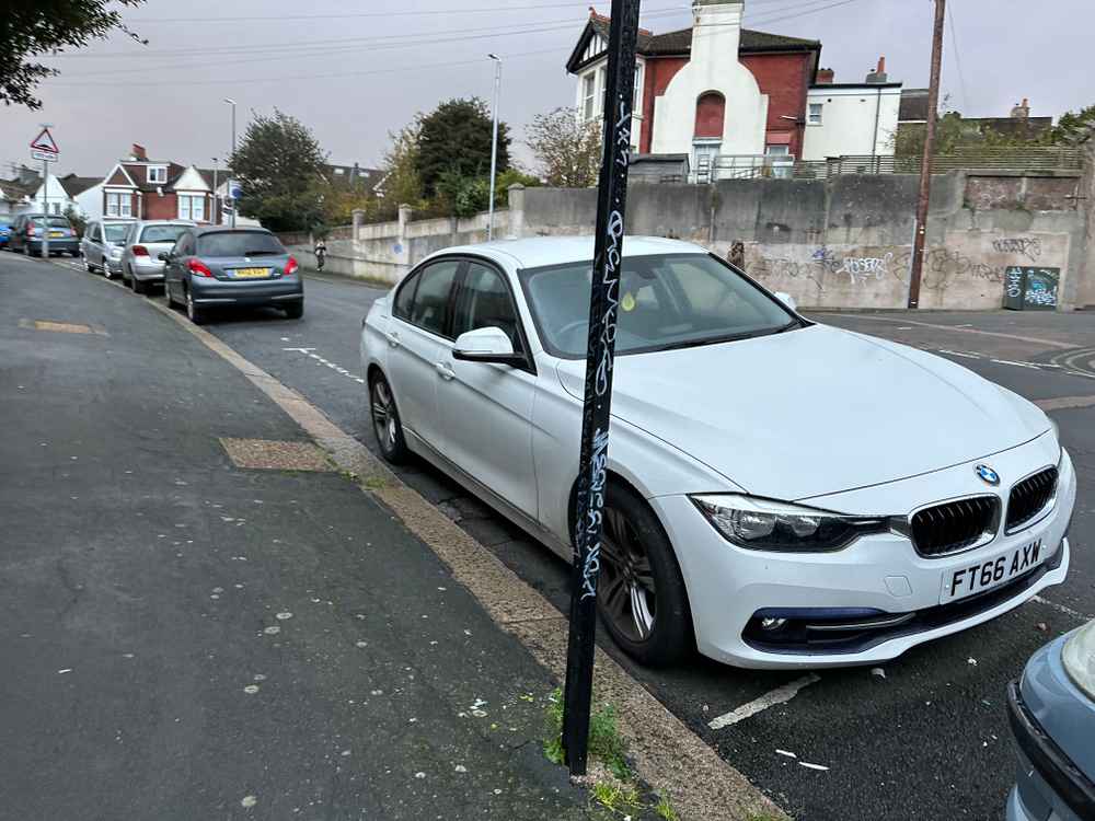 Photograph of FT66 AXW - a White BMW 3 Series parked in Hollingdean by a non-resident who uses the local area as part of their Brighton commute. The sixth of nine photographs supplied by the residents of Hollingdean.