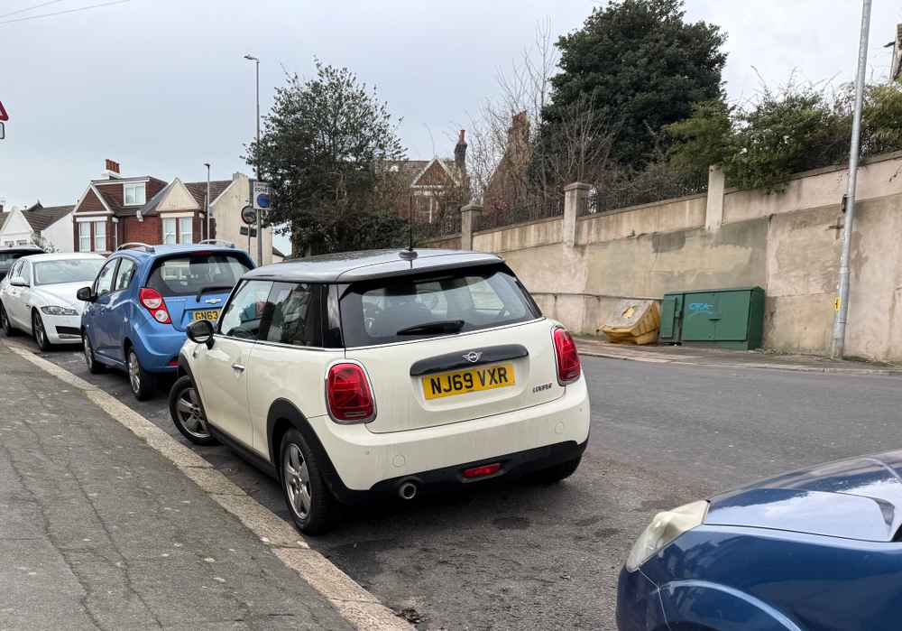 Photograph of NJ69 VXR - a Beige Mini Cooper parked in Hollingdean by a non-resident. The second of five photographs supplied by the residents of Hollingdean.