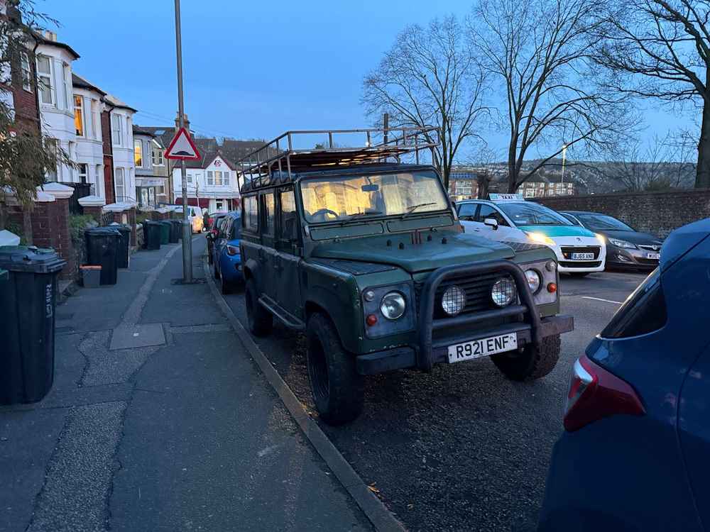 Photograph of R921 ENF - a Green Land Rover Defender parked in Hollingdean by a non-resident. The eleventh of twelve photographs supplied by the residents of Hollingdean.