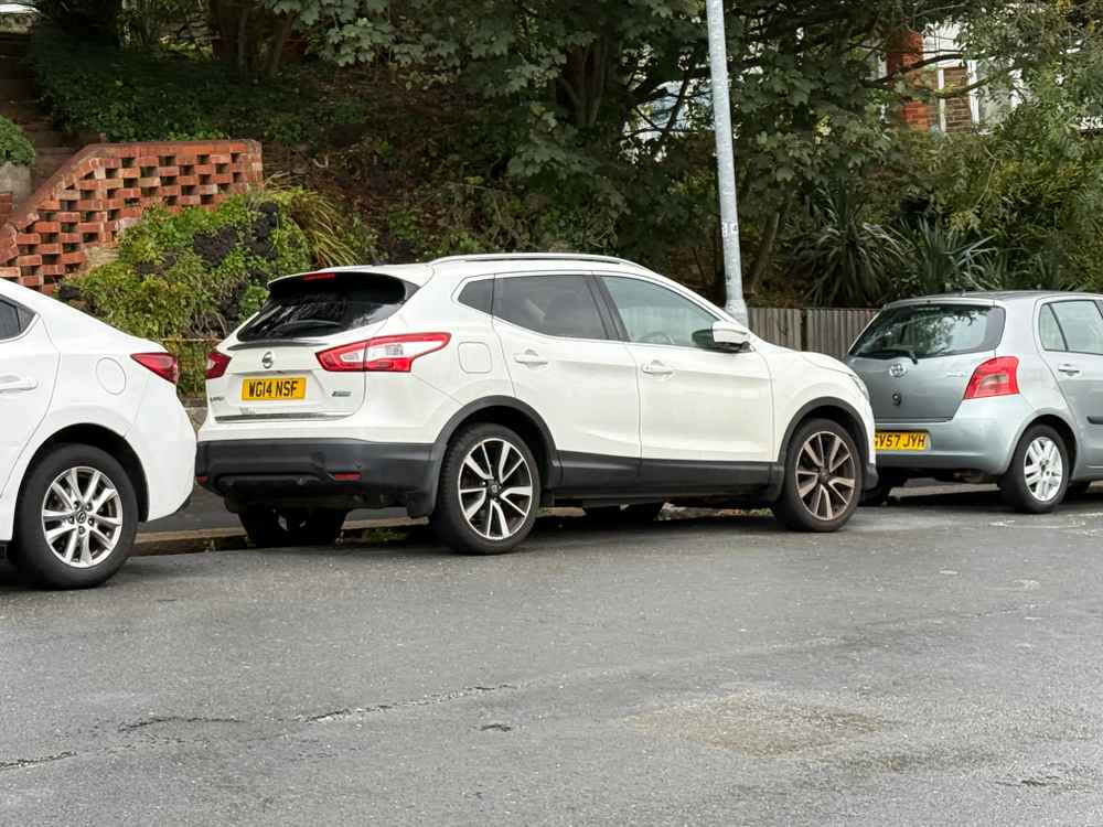Photograph of WG14 NSF - a White Nissan Qashqai parked in Hollingdean by a non-resident who uses the local area as part of their Brighton commute. The tenth of ten photographs supplied by the residents of Hollingdean.