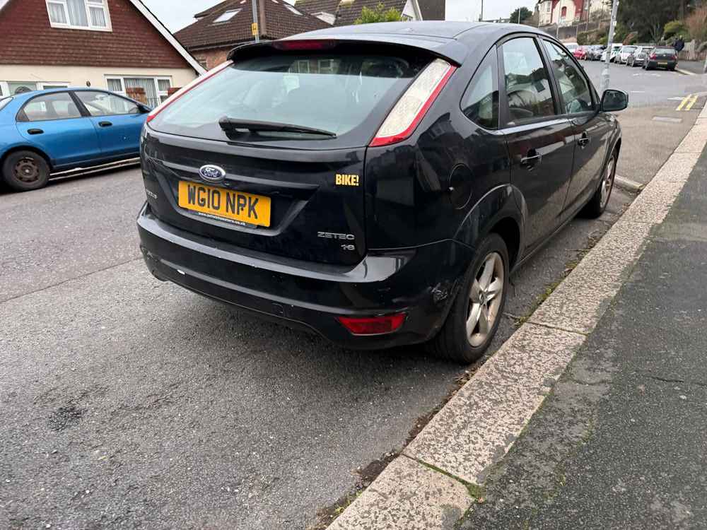 Photograph of WG10 NPK - a Black Ford Focus parked in Hollingdean by a non-resident. The fifteenth of seventeen photographs supplied by the residents of Hollingdean.