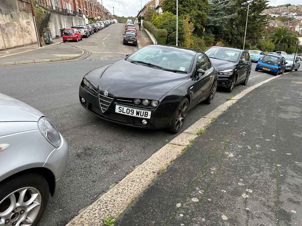 Photograph of SL09 WUB - a Black Alfa Romeo Brera parked in Hollingdean by a non-resident. The ninth of forty-four photographs supplied by the residents of Hollingdean.