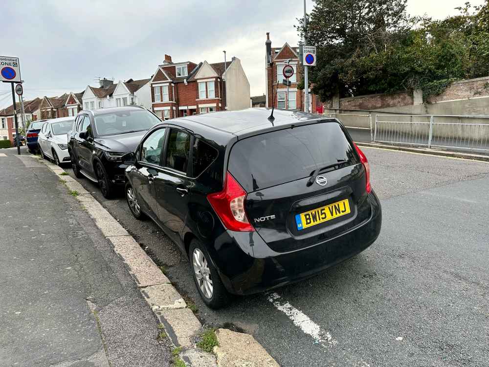 Photograph of BW15 VNJ - a Black Nissan Note parked in Hollingdean by a non-resident who uses the local area as part of their Brighton commute. The first of twenty photographs supplied by the residents of Hollingdean.