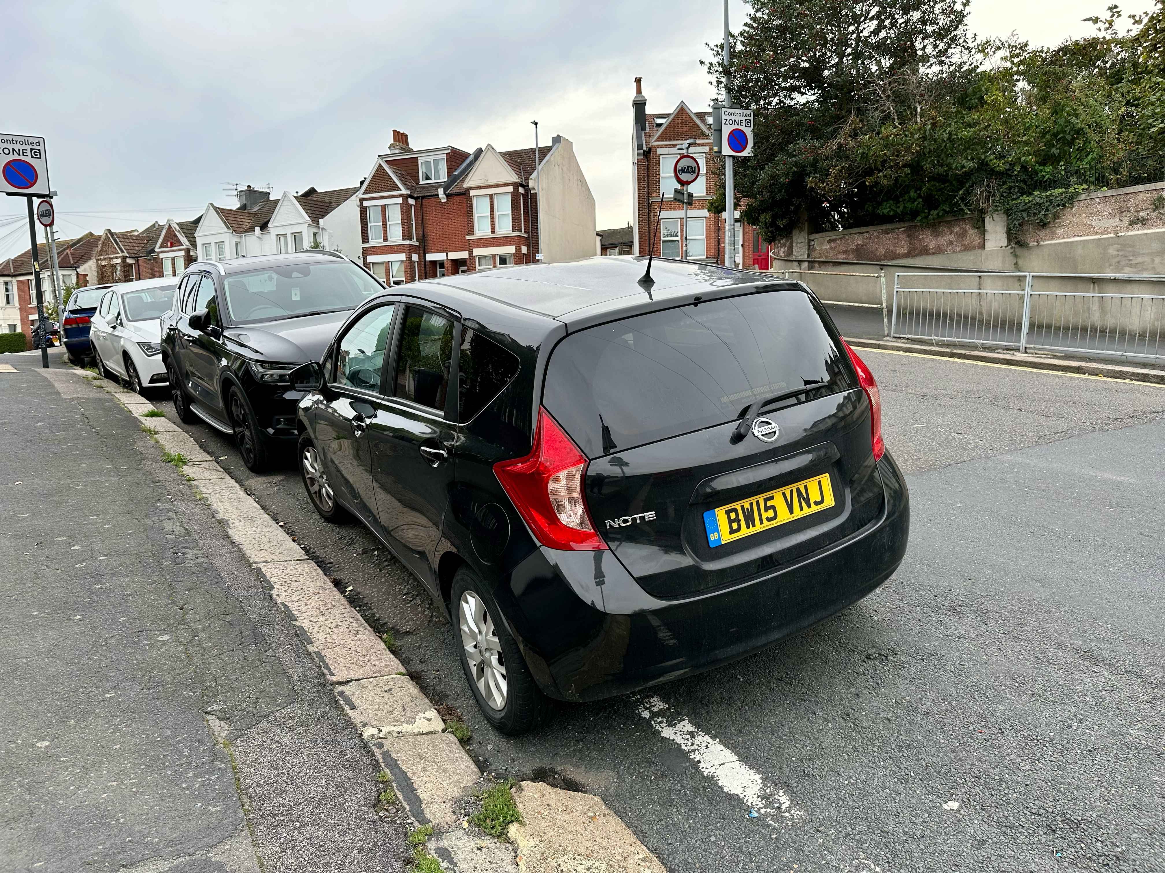Photograph of BW15 VNJ - a Black Nissan Note parked in Hollingdean by a non-resident who uses the local area as part of their Brighton commute. The first of fifteen photographs supplied by the residents of Hollingdean.