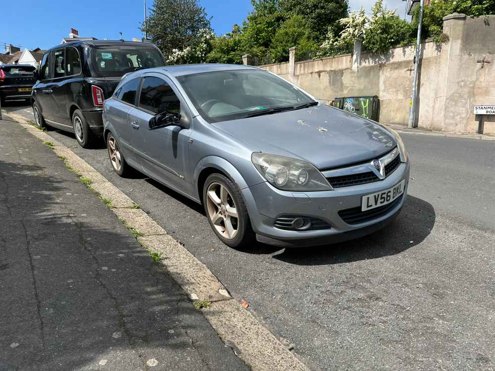 Photograph of LV56 BKL - a Blue Vauxhall Astra parked in Hollingdean by a non-resident, and potentially abandoned. The first of five photographs supplied by the residents of Hollingdean.