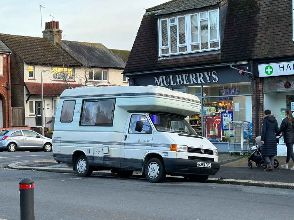 Photograph of R384 ORC - a Beige Volkswagen Transporter camper van parked in Hollingdean by a non-resident, and potentially abandoned. The tenth of thirteen photographs supplied by the residents of Hollingdean.