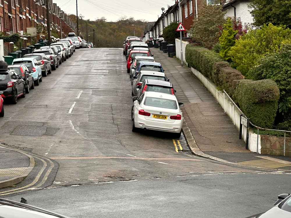 Photograph of FT66 AXW - a White BMW 3 Series parked in Hollingdean by a non-resident who uses the local area as part of their Brighton commute. The fifth of twenty-five photographs supplied by the residents of Hollingdean.