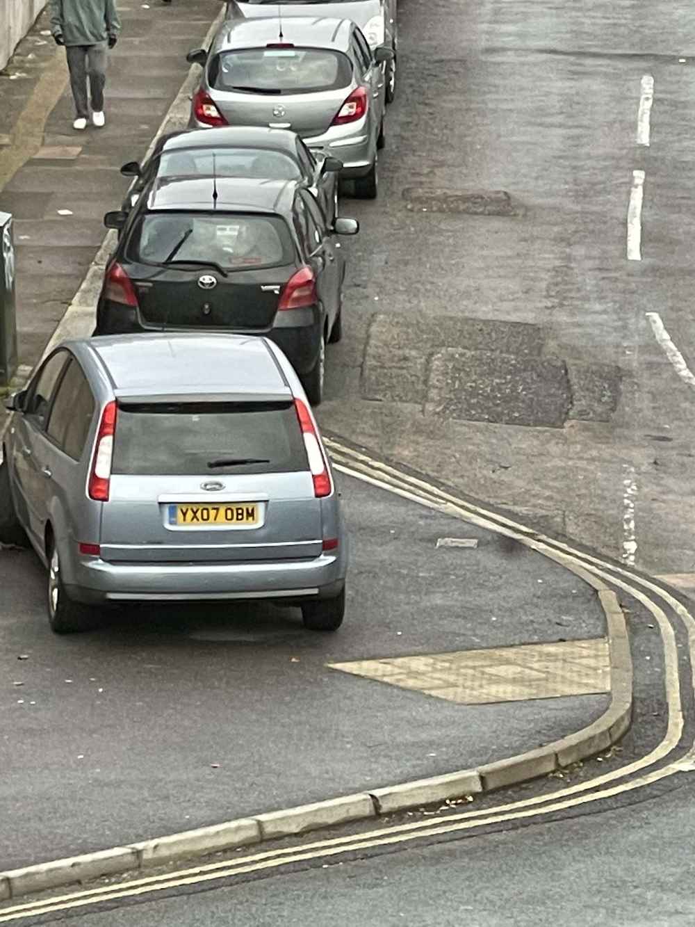 Photograph of YX07 OBM - a Silver Ford Focus C-Max parked in Hollingdean by a non-resident. The first of four photographs supplied by the residents of Hollingdean.