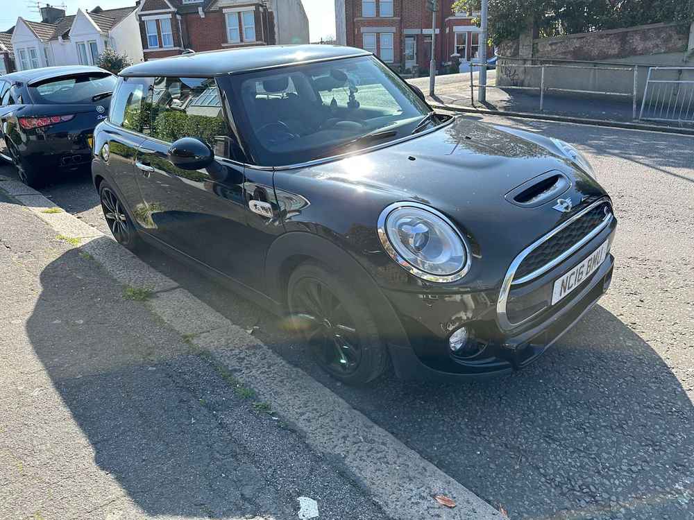 Photograph of NC16 BMU - a Black Mini Cooper parked in Hollingdean by a non-resident who uses the local area as part of their Brighton commute. The first of thirteen photographs supplied by the residents of Hollingdean.