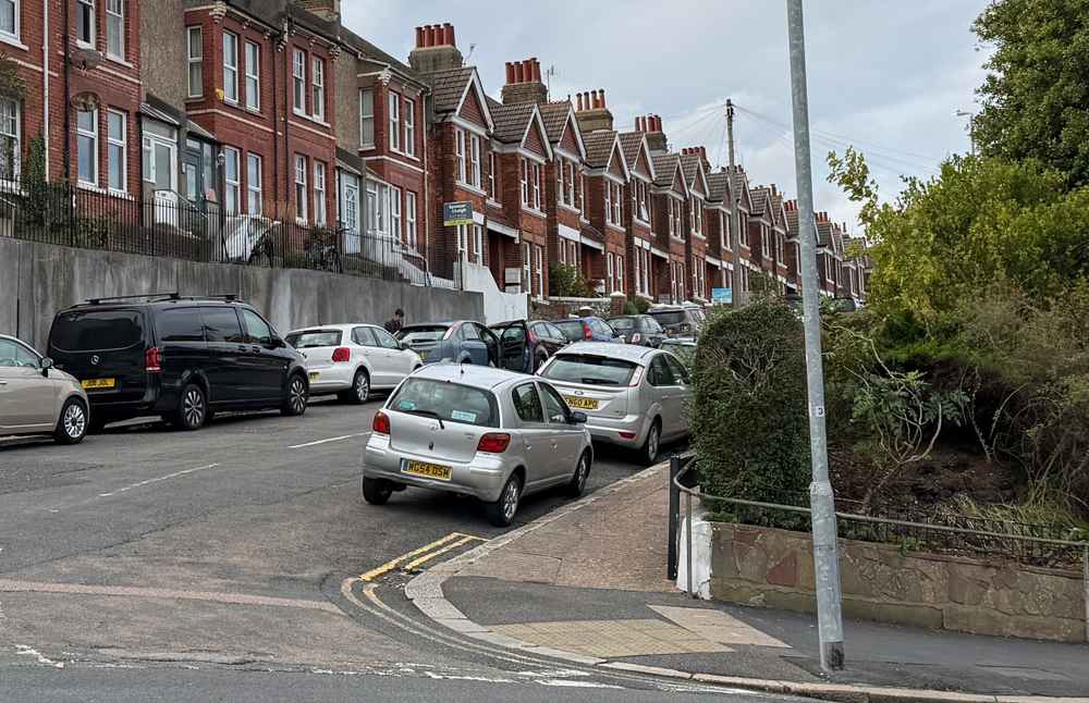 Photograph of WG54 OSM - a Silver Toyota Yaris parked in Hollingdean by a non-resident. The second of three photographs supplied by the residents of Hollingdean.