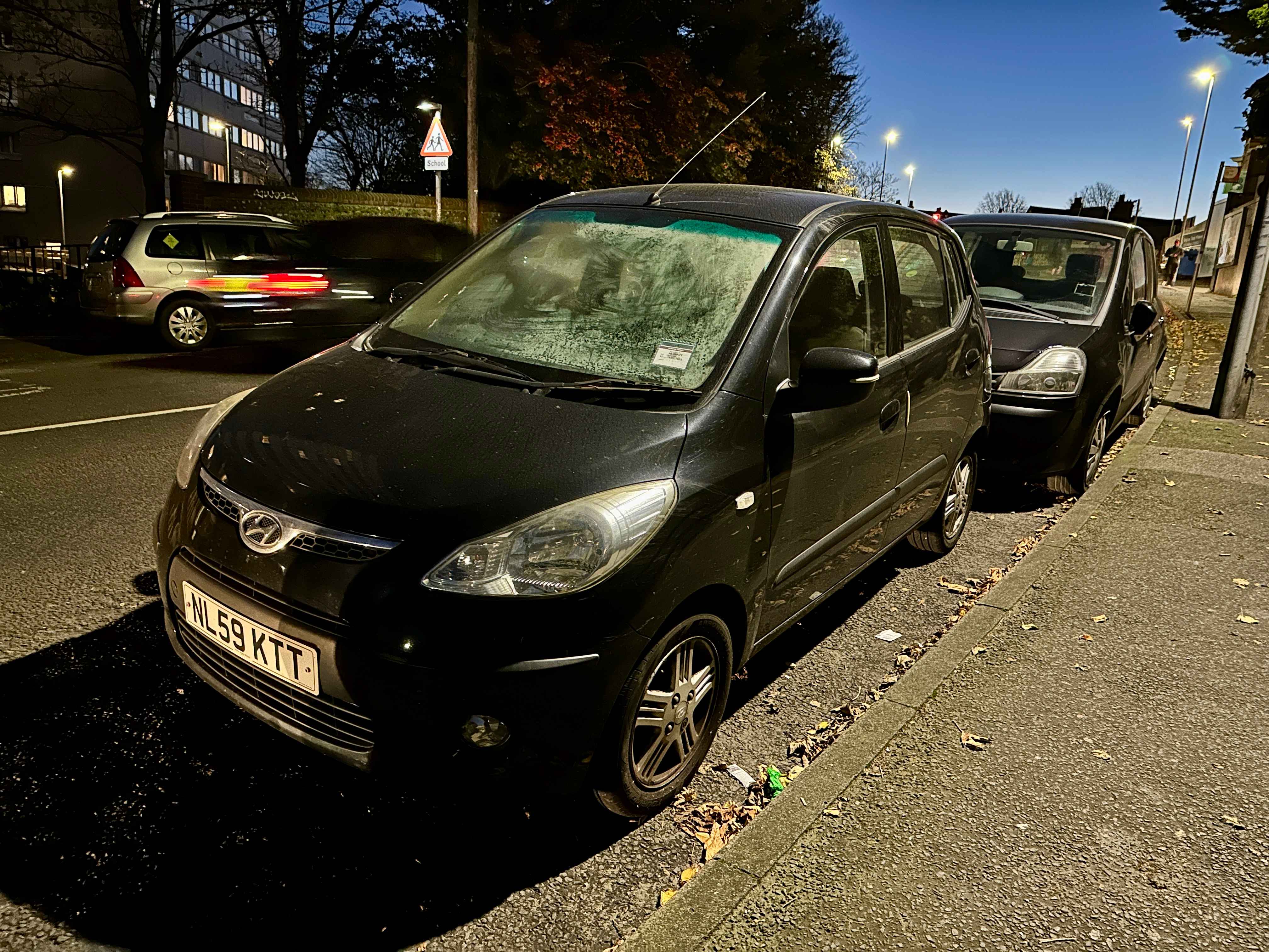 Photograph of NL59 KTT - a Black Hyundai i10 parked in Hollingdean by a non-resident. The second of three photographs supplied by the residents of Hollingdean.