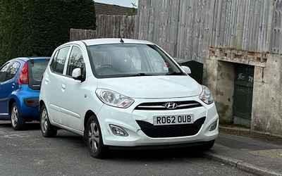 RO62 OUB, a White Hyundai i10 parked in Hollingdean
