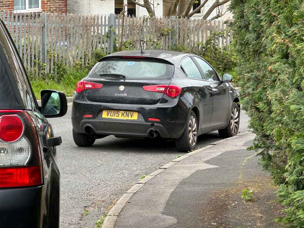 Photograph of VU15 KNV - a Black Alfa Romeo Giulietta parked in Hollingdean by a non-resident. The thirteenth of fifteen photographs supplied by the residents of Hollingdean.