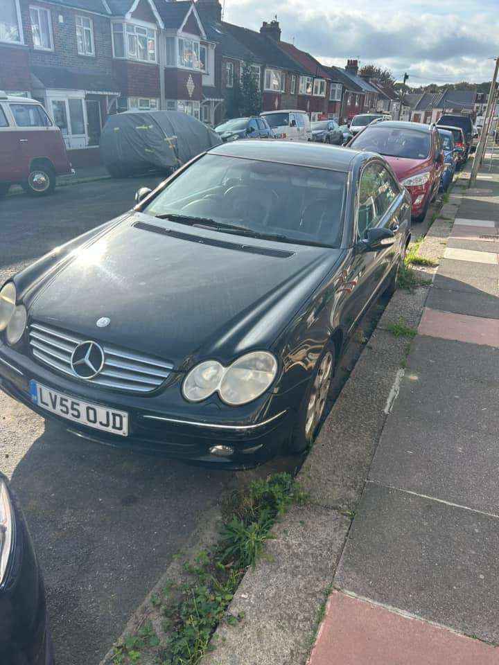 Photograph of LV55 OJD - a Black Mercedes CLK parked in Hollingdean by a non-resident, and potentially abandoned. The first of two photographs supplied by the residents of Hollingdean.