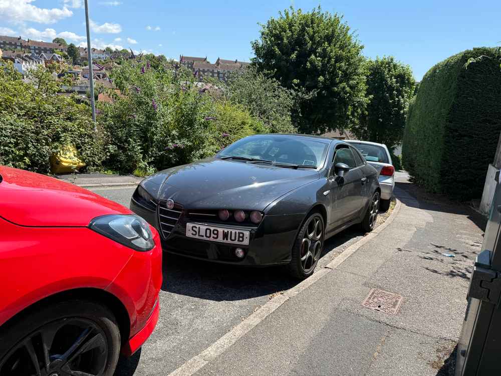 Photograph of SL09 WUB - a Black Alfa Romeo Brera parked in Hollingdean by a non-resident. The thirty-third of thirty-seven photographs supplied by the residents of Hollingdean.