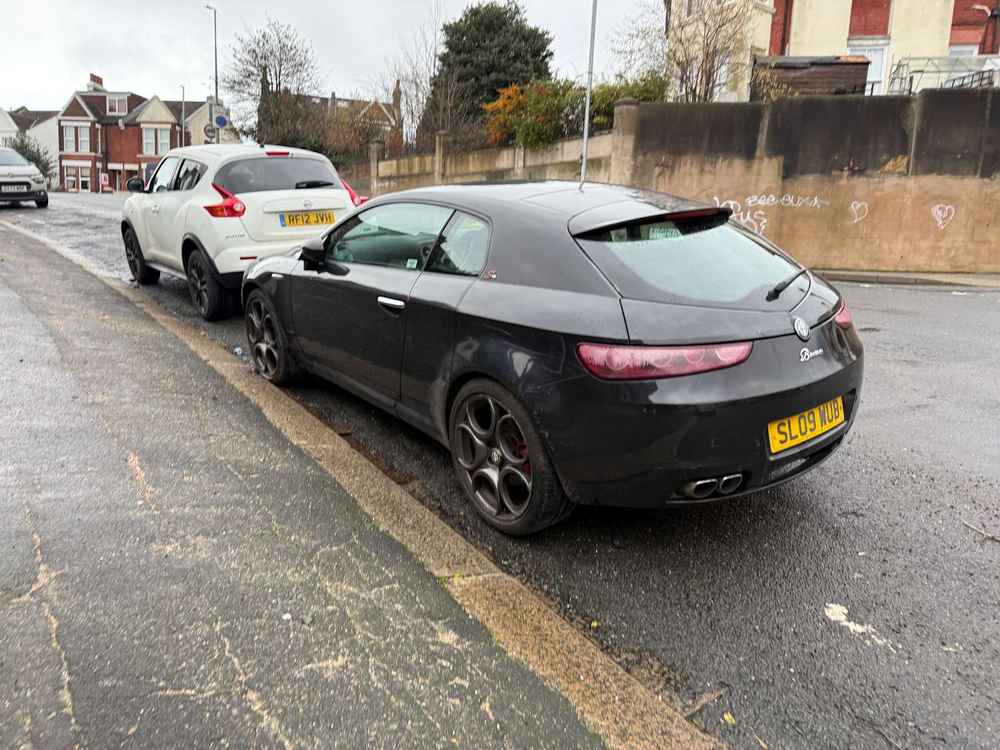 Photograph of SL09 WUB - a Black Alfa Romeo Brera parked in Hollingdean by a non-resident. The thirty-ninth of forty-four photographs supplied by the residents of Hollingdean.