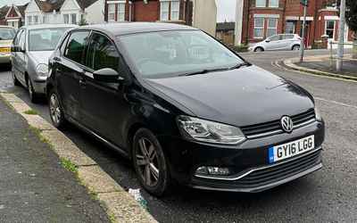 GY16 LGG, a Black Volkswagen Polo parked in Hollingdean