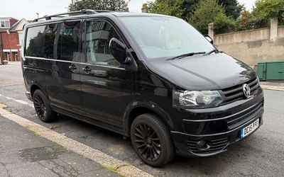 DC15 PPO, a Black Volkswagen Transporter parked in Hollingdean
