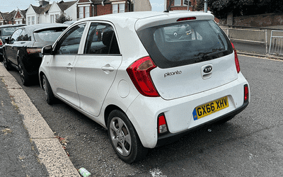 GY66 XHV, a White Kia Picanto parked in Hollingdean