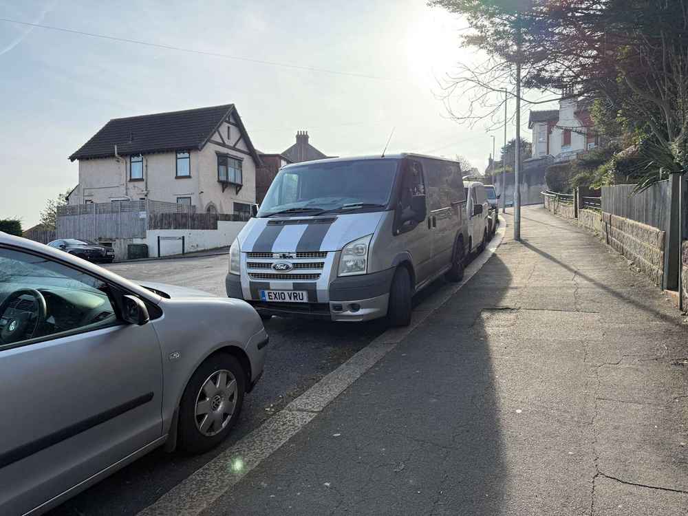 Photograph of EX10 VRU - a Silver Ford Transit parked in Hollingdean by a non-resident. The nineteenth of twenty-five photographs supplied by the residents of Hollingdean.