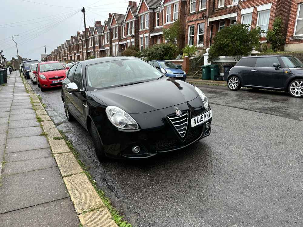 Photograph of VU15 KNV - a Black Alfa Romeo Giulietta parked in Hollingdean by a non-resident. The fifth of fifteen photographs supplied by the residents of Hollingdean.