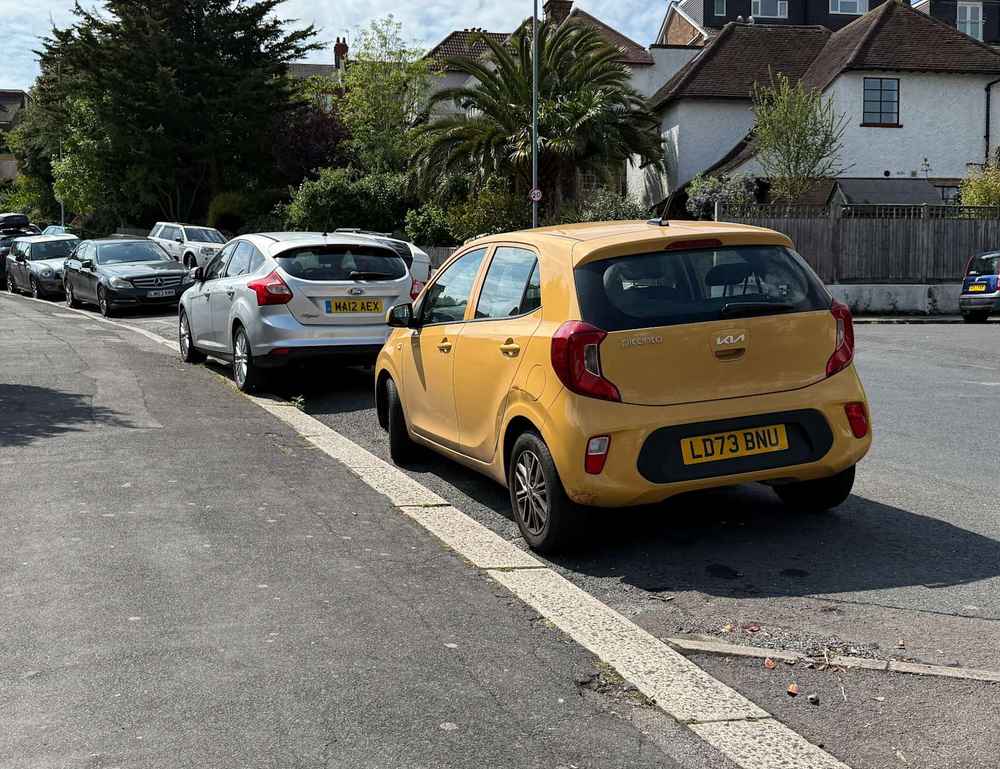 Photograph of LD73 BNU - a Yellow Kia Picanto parked in Hollingdean by a non-resident. The sixth of twelve photographs supplied by the residents of Hollingdean.