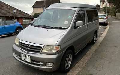 W616 VCD, a Silver Mazda Bongo parked in Hollingdean