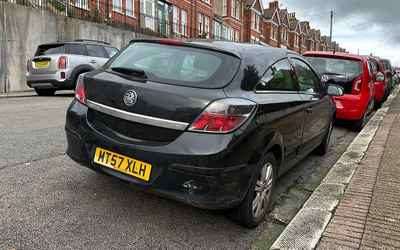 MT57 XLH, a Black Vauxhall Astra parked in Hollingdean