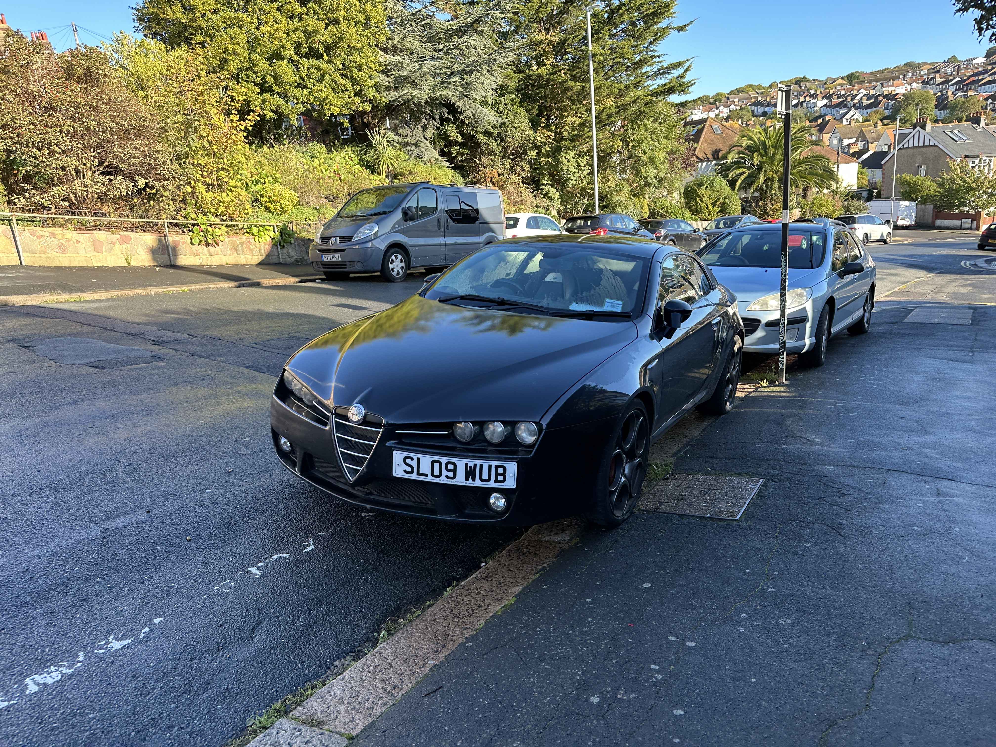 Photograph of SL09 WUB - a Black Alfa Romeo Brera parked in Hollingdean by a non-resident. The fifth of twenty photographs supplied by the residents of Hollingdean.