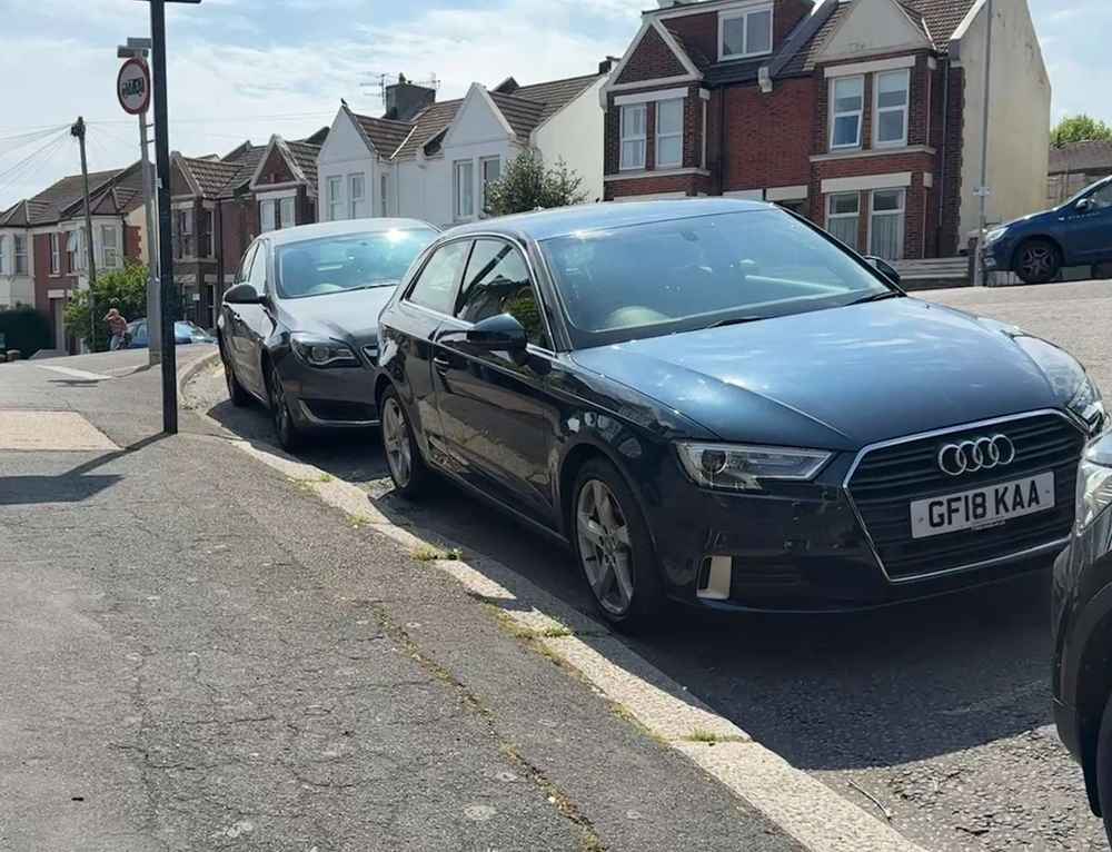 Photograph of GF18 KAA - a Blue Audi A3 parked in Hollingdean by a non-resident. The third of four photographs supplied by the residents of Hollingdean.