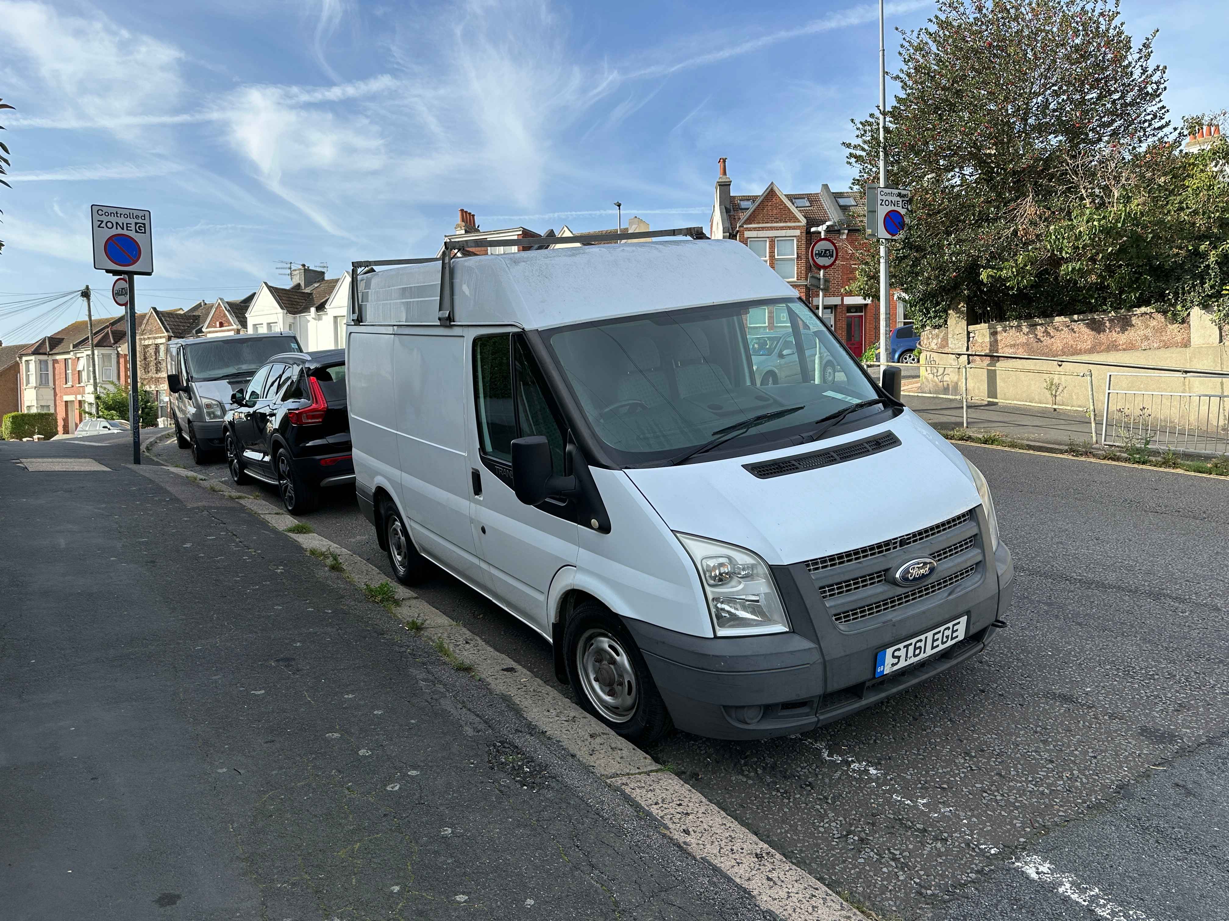 Photograph of ST61 EGE - a White Ford Transit parked in Hollingdean by a non-resident. The second of six photographs supplied by the residents of Hollingdean.
