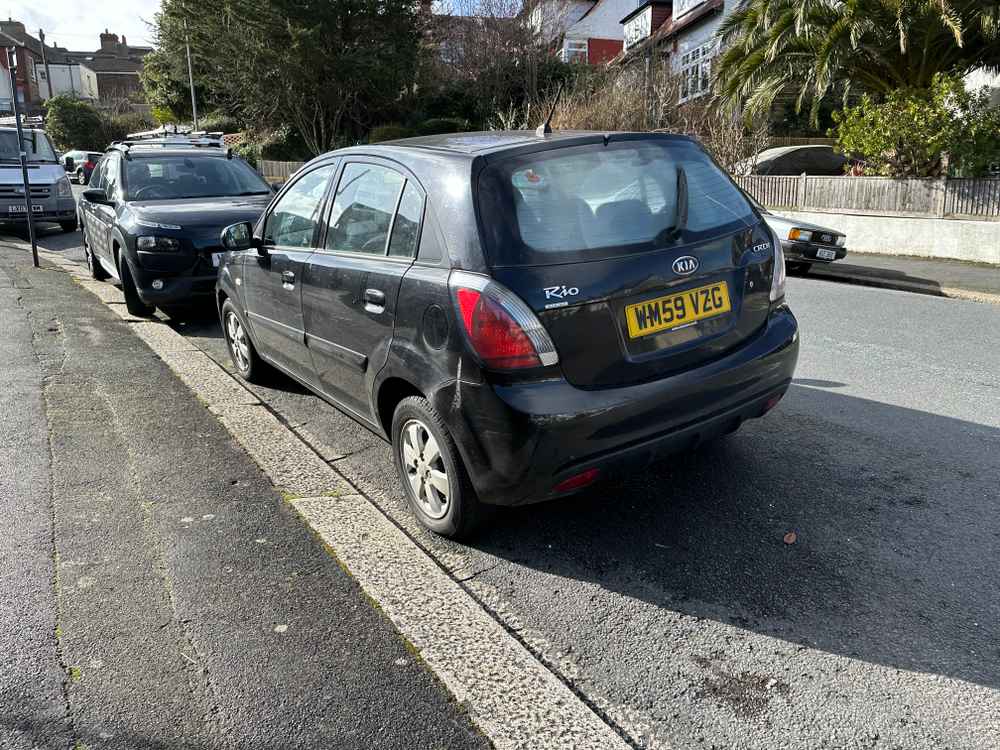 Photograph of WM59 VZG - a Black Kia Rio parked in Hollingdean by a non-resident. The fifth of eight photographs supplied by the residents of Hollingdean.