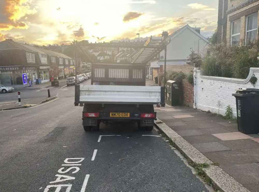 Photograph of WM70 EOX - a White Ford Transit Leader parked in Hollingdean by a non-resident. The first of two photographs supplied by the residents of Hollingdean.
