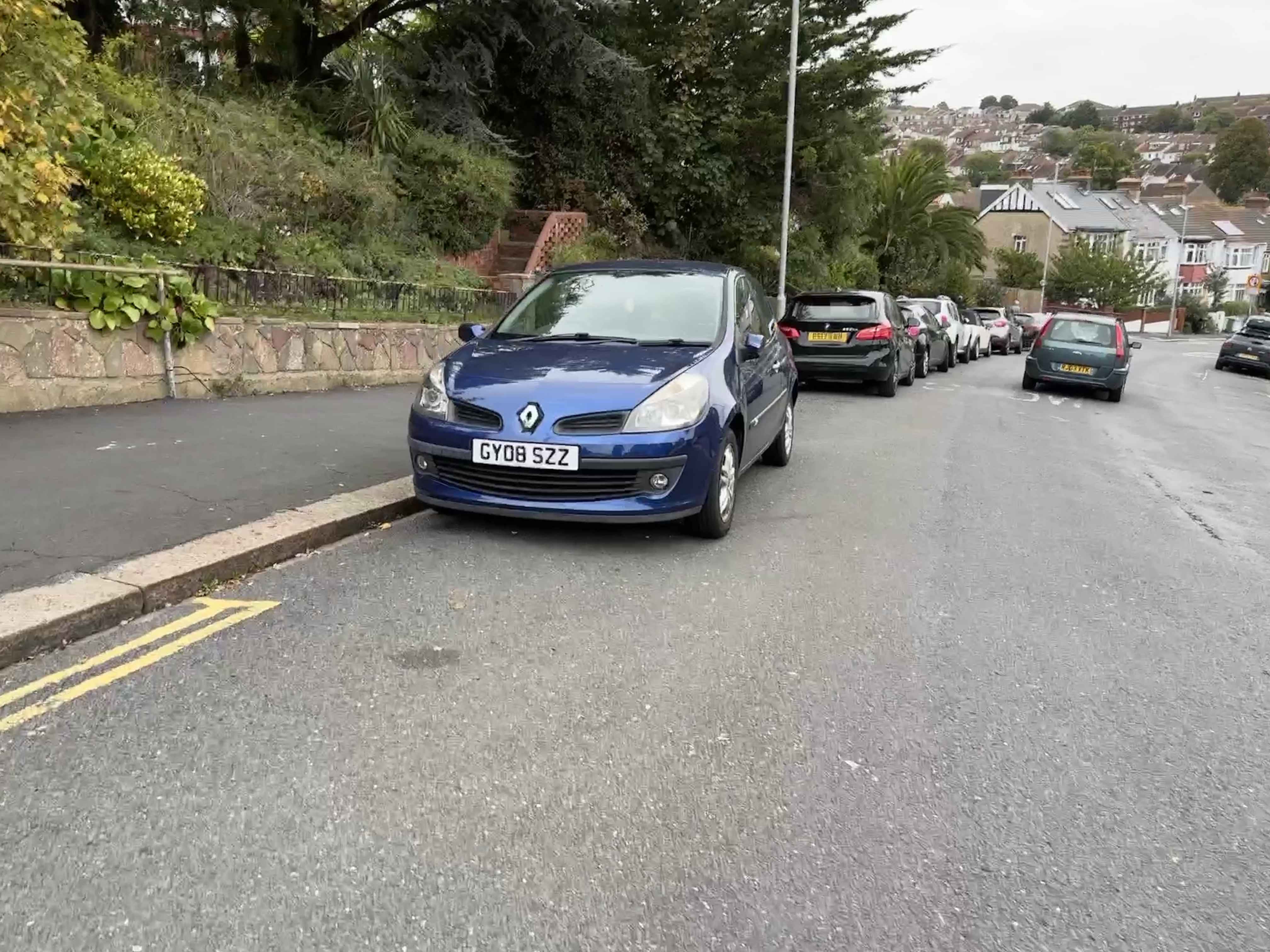 Photograph of GY08 SZZ - a Blue Renault Clio parked in Hollingdean by a non-resident. The first of two photographs supplied by the residents of Hollingdean.