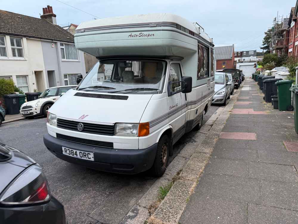 Photograph of R384 ORC - a Beige Volkswagen Transporter camper van parked in Hollingdean by a non-resident, and potentially abandoned. The fourteenth of fourteen photographs supplied by the residents of Hollingdean.