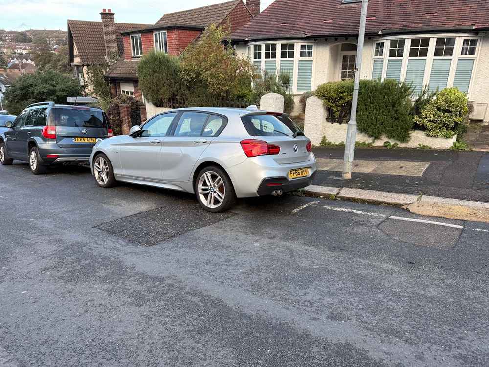 Photograph of PF66 BYV - a Silver BMW 1 Series parked in Hollingdean by a non-resident, and potentially abandoned. The third of three photographs supplied by the residents of Hollingdean.