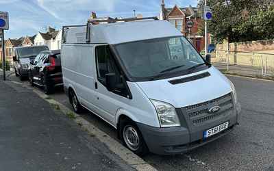 ST61 EGE, a White Ford Transit parked in Hollingdean