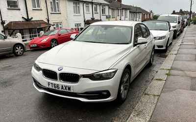 FT66 AXW, a White BMW 3 Series parked in Hollingdean