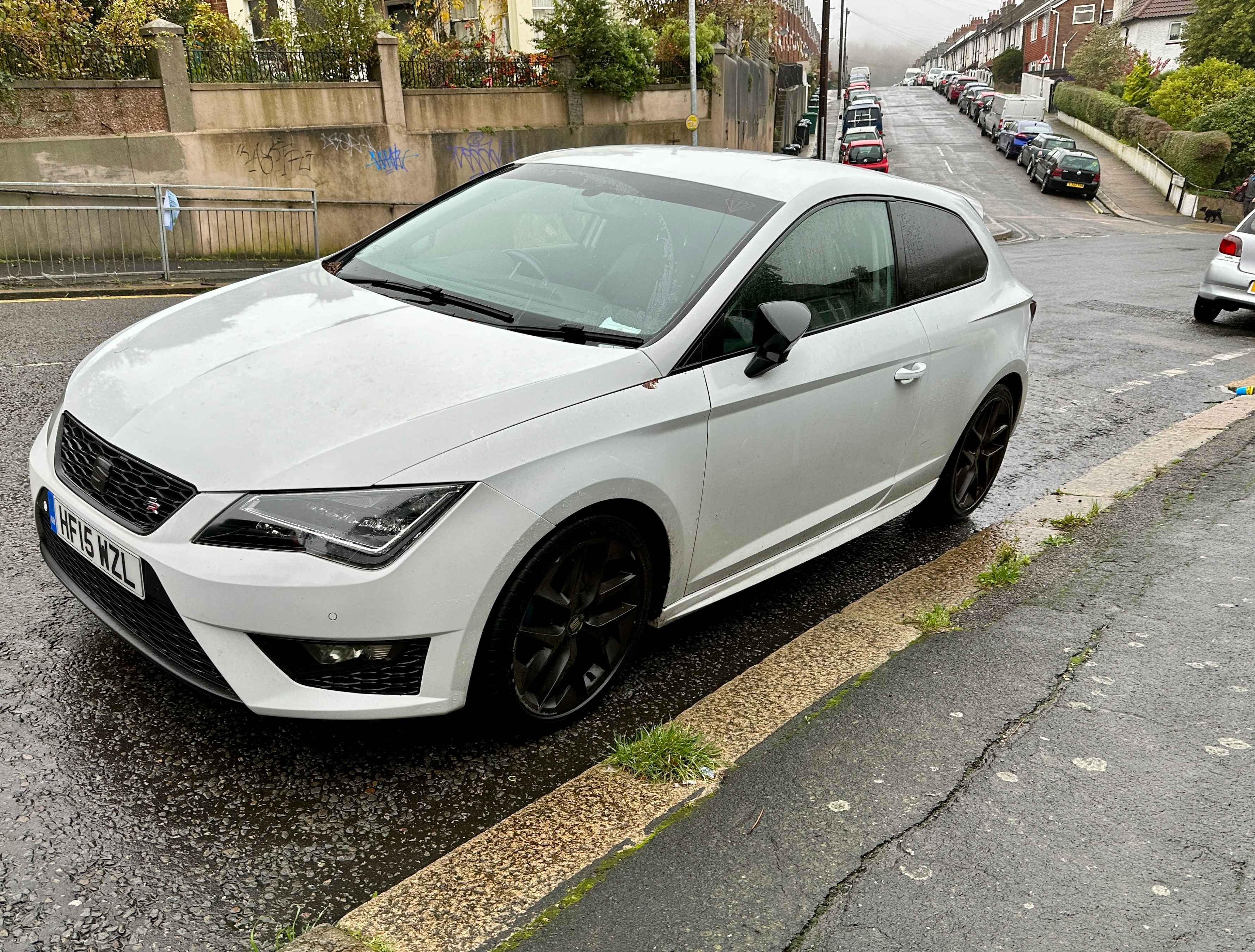 Photograph of HF15 WZL - a White Seat Leon parked in Hollingdean by a non-resident. The second of three photographs supplied by the residents of Hollingdean.