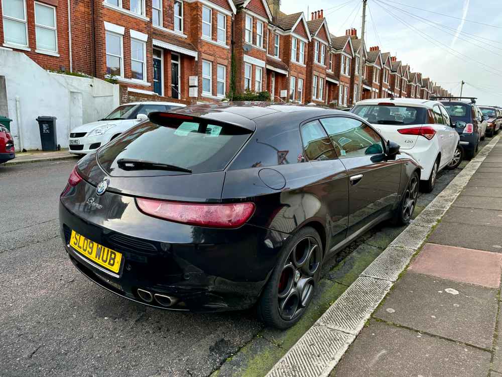 Photograph of SL09 WUB - a Black Alfa Romeo Brera parked in Hollingdean by a non-resident. The fifteenth of twenty-six photographs supplied by the residents of Hollingdean.