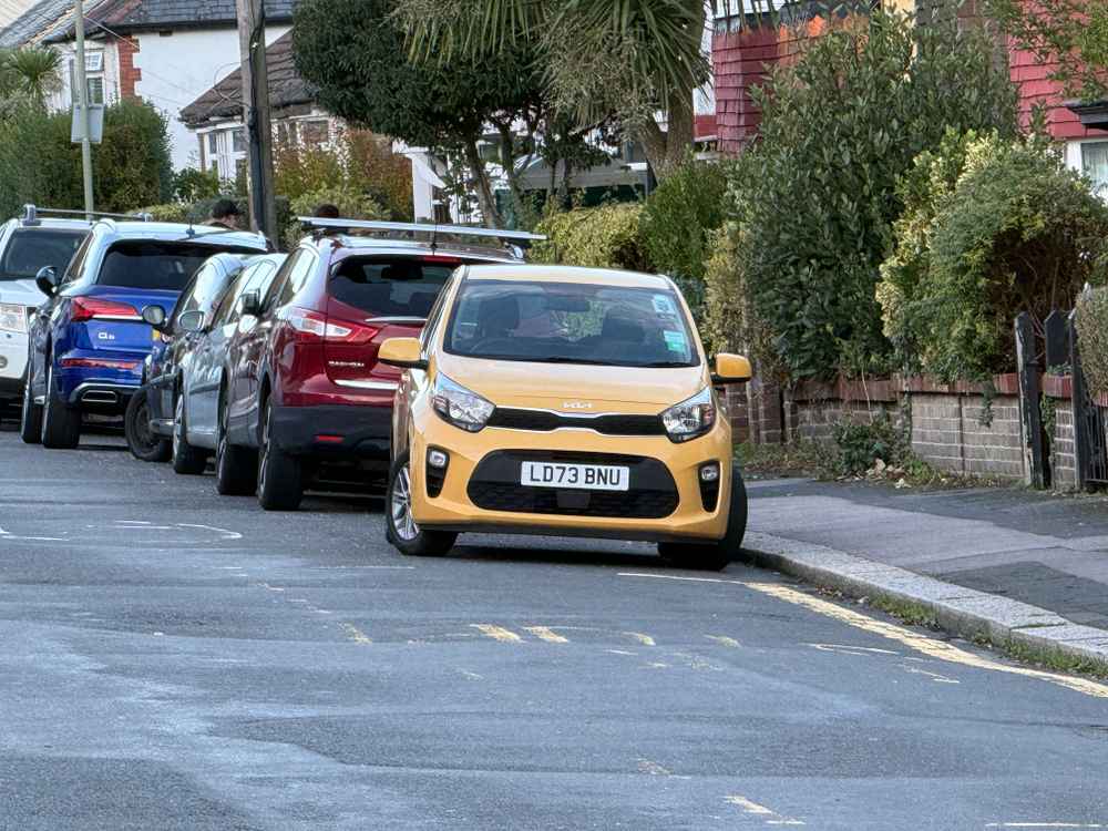 Photograph of LD73 BNU - a Yellow Kia Picanto parked in Hollingdean by a non-resident. The eighth of nine photographs supplied by the residents of Hollingdean.