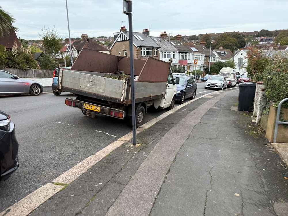 Photograph of BG54 JHU - a White Volkswagen T-Sporter parked in Hollingdean by a non-resident. The sixteenth of thirty-two photographs supplied by the residents of Hollingdean.