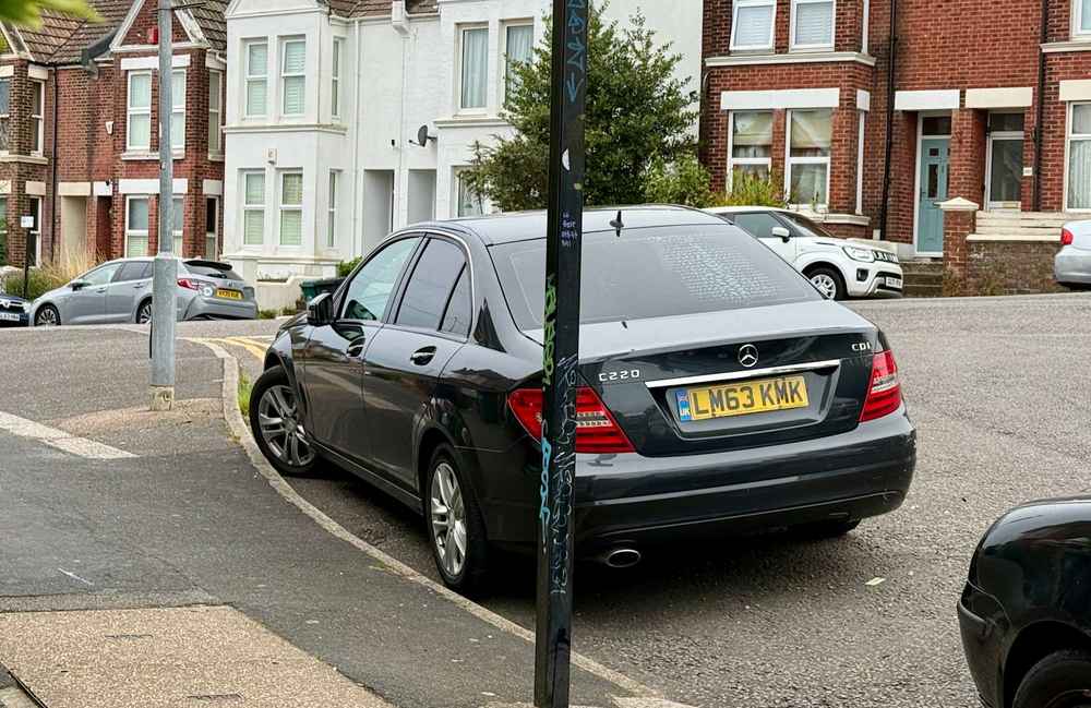 Photograph of LM63 KMK - a Black Mercedes C Class parked in Hollingdean by a non-resident who uses the local area as part of their Brighton commute. The fourth of eleven photographs supplied by the residents of Hollingdean.